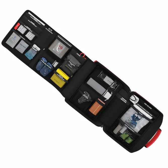 The Large Family First Aid Kit is fully open showing the organization of the supplies in the kit created by The Life Safety Pro